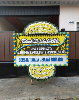 Papan Bunga Duka di Obio