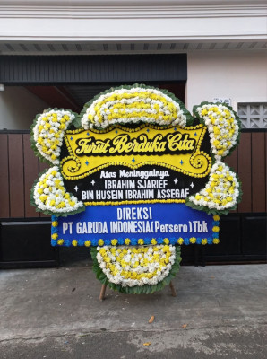 Papan Bunga Duka di Obio